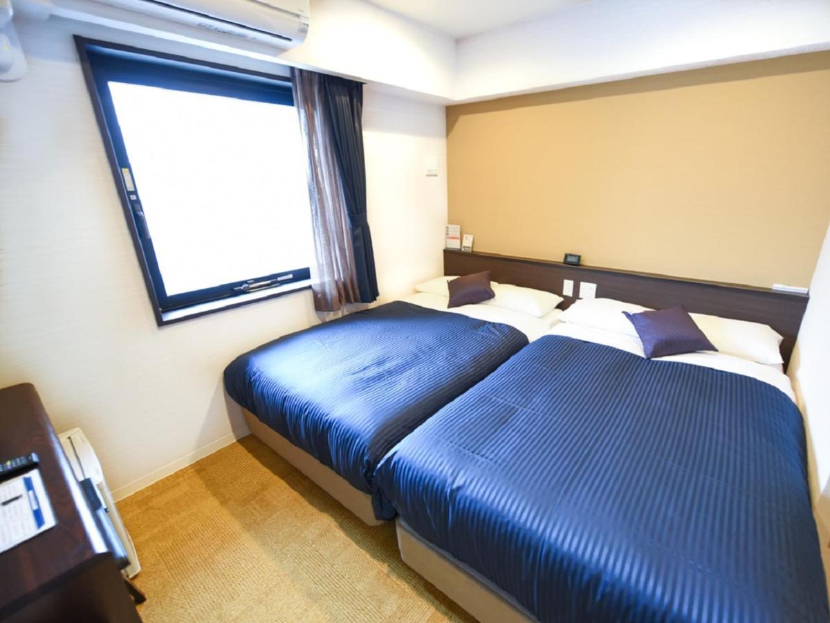 Hotel Livemax Fukuoka Tenjin Экстерьер фото