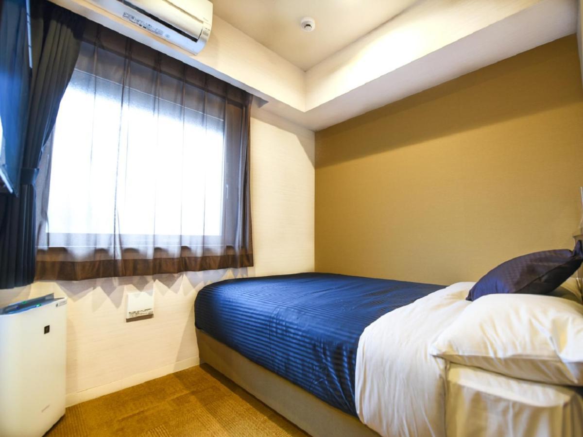 Hotel Livemax Fukuoka Tenjin Экстерьер фото